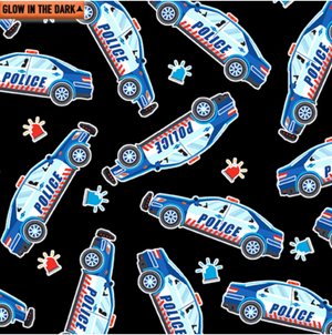 Save the Day - Police Cars on Black Glow in the Dark Fabric by Kanvas Studio